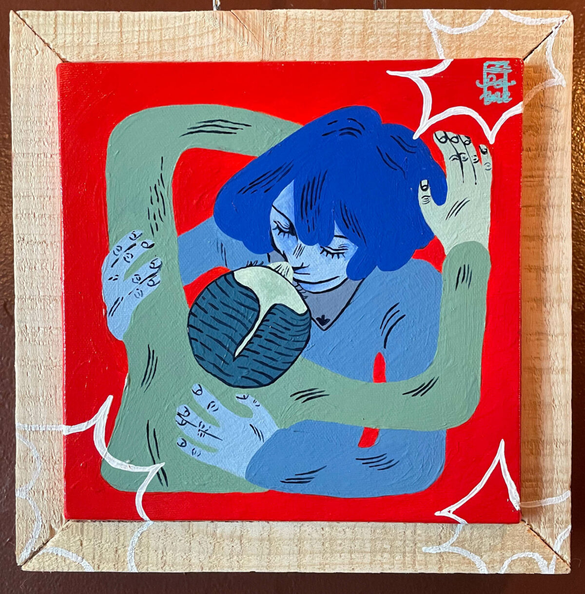 framed painting of two blue figures embracing on a red background